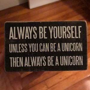 Wooden unicorn sign